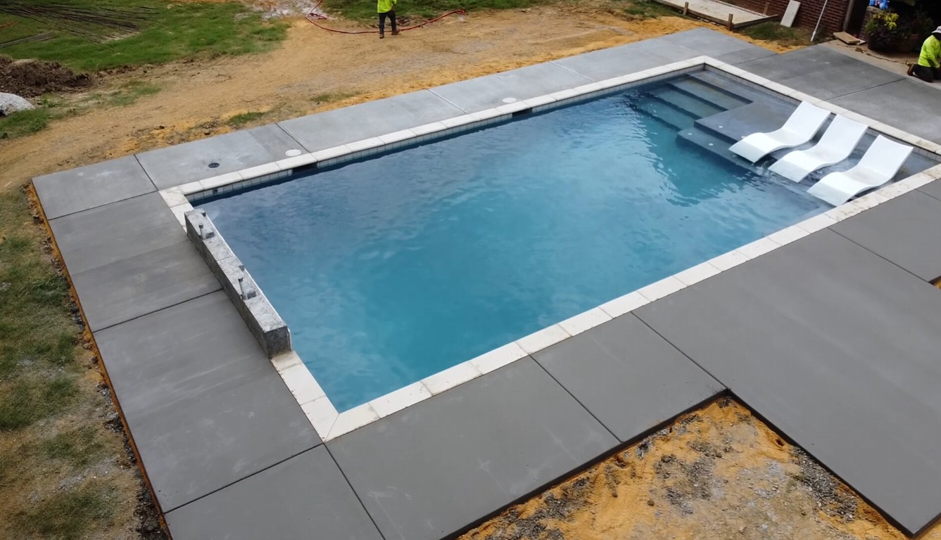 Concrete leveling and mudjacking service raising a sunken slab in Hayward, CA