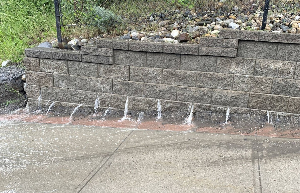 Concrete pool deck installation surrounding a residential swimming pool in Hayward, CA